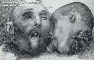 Richard Childers mobbing image #1 - two decapitated heads